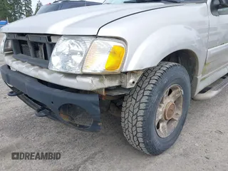 2003 Ford Explorer Sport Trac XLS z VIN 1FMZU77E93UA38468, wystawiony jako IAAI lot #41667956 z przebiegiem 291 806 mil mil oraz . Historia ofert i sprzedaży dostępna na DreamBid. Obrazek 6.