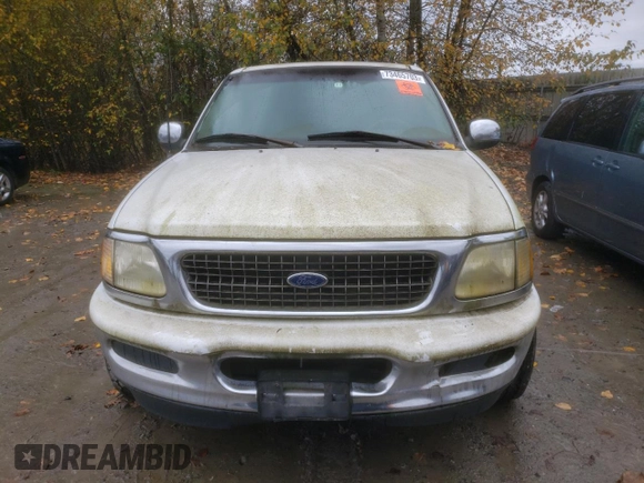 1997 Ford Expedition XLT z VIN 1FMEU17L6VLA61113, wystawiony jako Copart lot #73465703 z przebiegiem 184 878 mil mil oraz Czysty tytuł • Clean title. Historia ofert i sprzedaży dostępna na DreamBid. Obrazek 5.