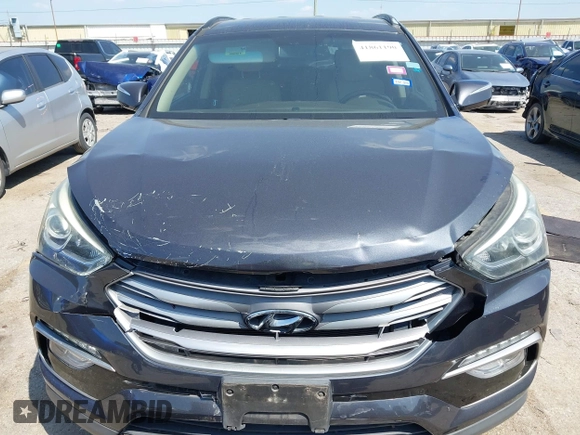 2017 Hyundai Santa Fe 2.4L z VIN 5XYZU3LB4HG462058, wystawiony jako IAAI lot #41861190 z przebiegiem 87 102 mil mil oraz . Historia ofert i sprzedaży dostępna na DreamBid. Obrazek 12.