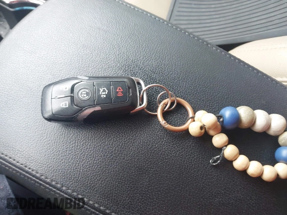 2016 Ford Explorer Limited z VIN 1FM5K8FH1GGC03374, wystawiony jako IAAI lot #41193336 z przebiegiem 124 853 mil mil oraz . Historia ofert i sprzedaży dostępna na DreamBid. Obrazek 11.