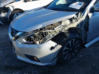 2018 Nissan Altima S with VIN 1N4AL3AP2JC239743, listed as a IAAI auction lot 41683606 with 141,354 mi miles and . Bid and sale history available at DreamBid. Image 6.