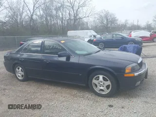 2000 Lincoln LS with VIN 1LNHM87A6YY879355, listed as a IAAI auction lot 41917760 with 70,457 mi miles. Bid and sale history available at carsss.com. Image 13.