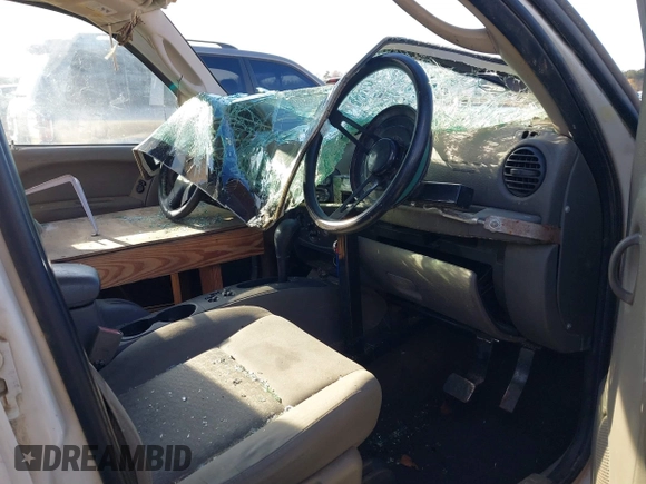 2005 Jeep Liberty Sport with VIN 1J4GK48KX5W679070, listed as a IAAI auction lot 41807899 with 157,726 mi miles. Bid and sale history available at carsss.com. Image 5.