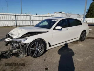2016 BMW 7 Series 740i with VIN WBA7E2C58GG714671, listed as a Copart auction lot 88728115 with 105,721 mi miles and Salvage Title. Bid and sale history available at carsss.com. Image 1.