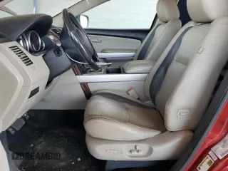 2009 Mazda CX-9 Grand Touring с VIN JM3TB28V490177643, выставлен на аукционе Copart как лот 64671455 с пробегом 132 972 миль миль и Списание • Salvage title. История ставок и продаж доступна на DreamBid. Изображение 7.