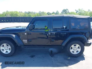 2018 Jeep Wrangler Unlimited Sport with VIN 1C4HJXDN3JW198375, listed as a IAAI auction lot 41965568 with 106,418 mi miles and . Bid and sale history available at DreamBid. Image 14.