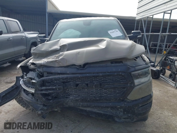 2020 Ram 1500 Big Horn with VIN 1C6SRFFT0LN301093, listed as a IAAI auction lot 41607746 with 65,223 mi miles and . Bid and sale history available at DreamBid. Image 12.