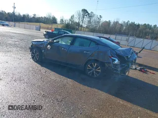 2016 Nissan Maxima SV z VIN 1N4AA6APXGC386974, wystawiony jako IAAI lot #41738932 z przebiegiem 132 395 mil mil oraz . Historia ofert i sprzedaży dostępna na DreamBid. Obrazek 3.
