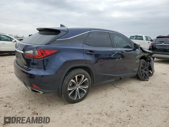 2022 Lexus RX with VIN 2T2HZMAAXNC256730, listed as a Copart auction lot 44689865 with 31,877 mi miles and Salvage Title. Bid and sale history available at carsss.com. Image 3.