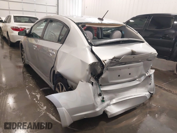 2012 Nissan Sentra S with VIN 3N1AB6AP1CL621898, listed as a IAAI auction lot 42378952 with 123,379 mi miles and . Bid and sale history available at DreamBid. Image 6.