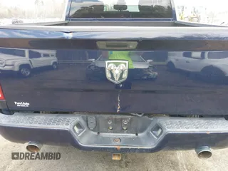 2014 Ram 1500 Express z VIN 1C6RR6KT0ES204081, wystawiony jako IAAI lot #41837967 z przebiegiem 169 256 mil mil oraz . Historia ofert i sprzedaży dostępna na DreamBid. Obrazek 6.