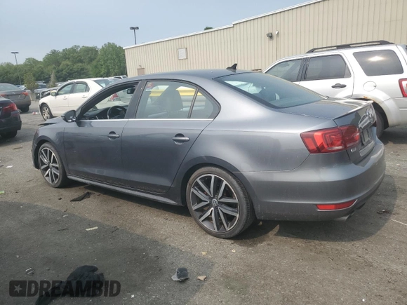 2014 Volkswagen Jetta GLI with VIN 3VW4T7AJ3EM352712, listed as a Copart auction lot 59582825 with 145,765 mi miles and Salvage title. Bid and sale history available at DreamBid. Image 2.