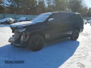 2023 Cadillac Escalade 4WD Premium Luxury z VIN 1GYS4BKL8PR119964, wystawiony jako Copart lot #89405635 z przebiegiem 34 143 mil mil oraz Szkody całkowita. Historia ofert i sprzedaży dostępna na DreamBid. Obrazek 1.