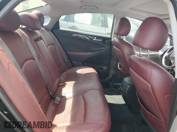 2012 Hyundai Sonata Limited z VIN 5NPEC4AB1CH365296, wystawiony jako Copart lot #58725255 z przebiegiem 118 332 mil mil oraz Szkoda całkowita • Salvage title. Historia ofert i sprzedaży dostępna na DreamBid. Obrazek 10.