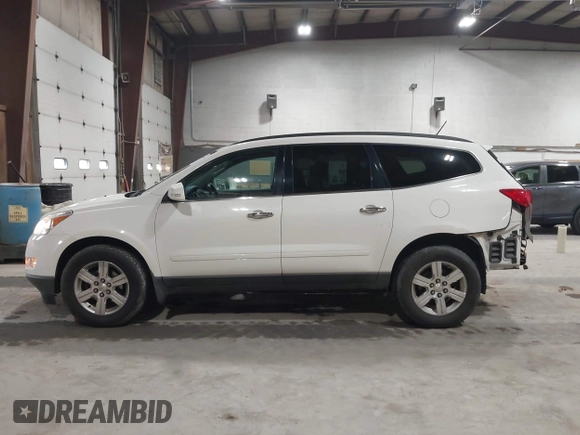 2012 Chevrolet Traverse 1LT z VIN 1GNKVGEDXCJ241794, wystawiony jako IAAI lot #41902110 z przebiegiem 138 305 mil mil oraz . Historia ofert i sprzedaży dostępna na DreamBid. Obrazek 14.