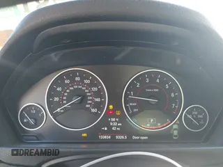 2014 BMW 4 Series 428i with VIN WBA3N3C53EF712057, listed as a IAAI auction lot 41868781 with 133,834 mi miles and . Bid and sale history available at DreamBid. Image 7.