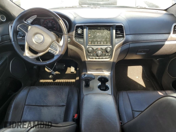 2014 Jeep Grand Cherokee Summit with VIN 1C4RJFJTXEC134150, listed as a Copart auction lot 61859265 with 159,262 mi miles and Salvage title. Bid and sale history available at DreamBid. Image 8.