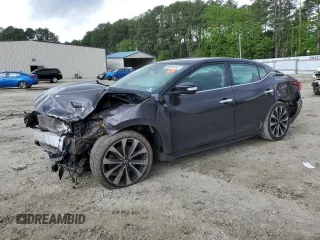 2016 Nissan Maxima SR with VIN 1N4AA6AP5GC407486, listed as a Copart auction lot 56646495 with 160,229 mi miles and Salvage title. Bid and sale history available at DreamBid. Image 1.