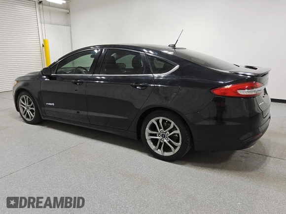 2017 Ford Fusion Hybrid SE with VIN 3FA6P0LU9HR216757, listed as a Copart auction lot 64430315 with 106,247 mi miles and Clean title. Bid and sale history available at DreamBid. Image 2.