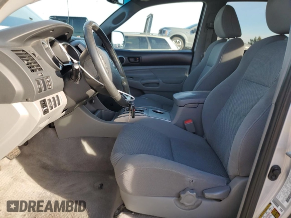 2011 Toyota Tacoma PreRunner with VIN 3TMJU4GN7BM114871, listed as a Copart auction lot 87256214 with 214,236 mi miles and Salvage Title. Bid and sale history available at DreamBid. Image 7.