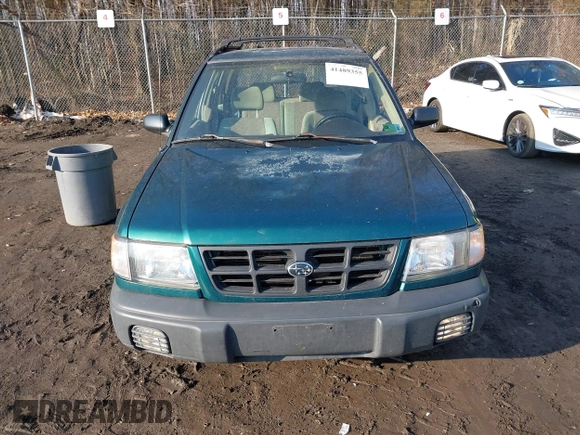 1999 Subaru Forester L with VIN JF1SF635XXH735202, listed as a IAAI auction lot 41489355 with 290,000 mi miles. Bid and sale history available at carsss.com. Image 12.