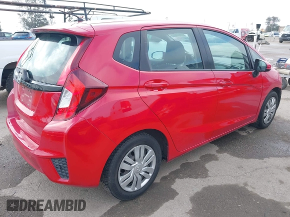 2015 Honda Fit LX with VIN 3HGGK5H52FM762596, listed as a IAAI auction lot 42129871 with 62,323 mi miles and . Bid and sale history available at DreamBid. Image 4.