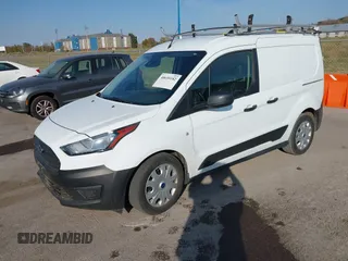2021 Ford Transit Connect XL with VIN NM0LS6E25M1488265, listed as a IAAI auction lot 40655182 with 21,583 mi miles and . Bid and sale history available at DreamBid. Image 2.