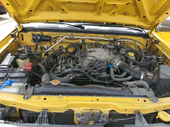 2003 Nissan Xterra XE with VIN 5N1ED28T83C665215, listed as a Copart auction lot 64306605 with 216,723 mi miles and Clean title. Bid and sale history available at DreamBid. Image 12.