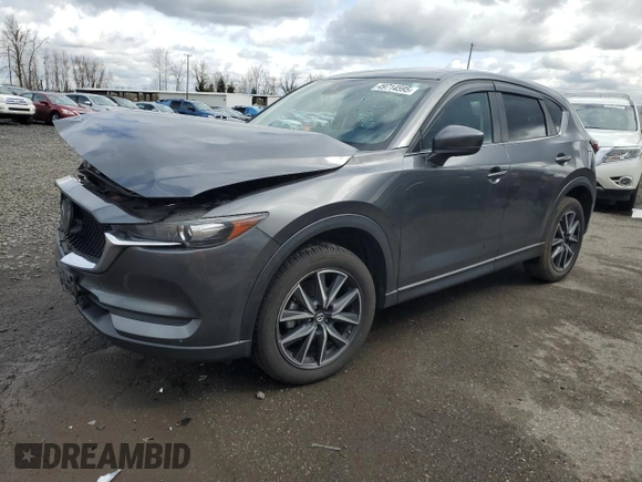 2018 Mazda CX-5 Touring with VIN JM3KFBCM1J0372702, listed as a Copart auction lot 49714595 with 107,805 mi miles and Salvage Title. Bid and sale history available at carsss.com. Image 1.