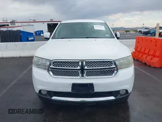 2013 Dodge Durango SXT with VIN 1C4RDJAG7DC659050, listed as a IAAI auction lot 42637236 with 162,458 mi miles and . Bid and sale history available at DreamBid. Image 6.