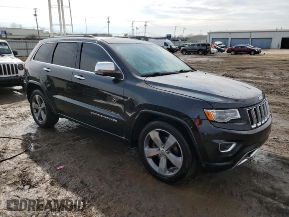 2016 Jeep Grand Cherokee Overland with VIN 1C4RJFCG8GC402339, listed as a Copart auction lot 47553385 with 121,486 mi miles and Salvage title. Bid and sale history available at DreamBid. Image 4.