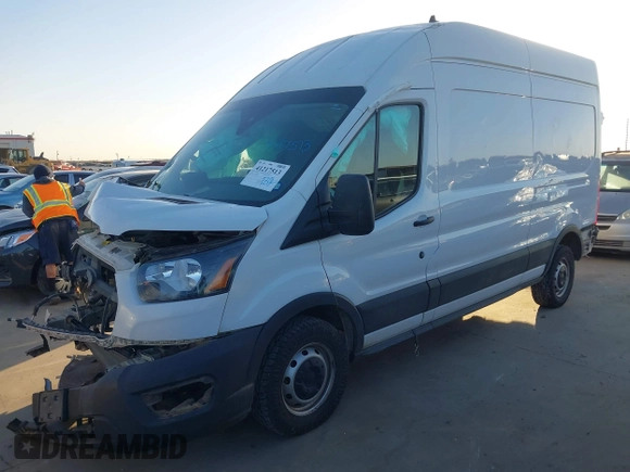 2020 Ford Transit Cargo with VIN 1FTBR1X82LKB80557, listed as a IAAI auction lot 41217513 with 89,774 mi miles and . Bid and sale history available at DreamBid. Image 2.