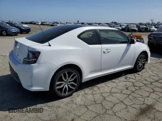 2014 Scion tC z VIN JTKJF5C71E3082375, wystawiony jako Copart lot #56909095 z przebiegiem 140 165 mil mil oraz Szkoda całkowita • Salvage title. Historia ofert i sprzedaży dostępna na DreamBid. Obrazek 3.