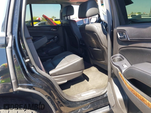 2015 Chevrolet Tahoe LTZ z VIN 1GNSKCKC7FR715512, wystawiony jako IAAI lot #42054583 z przebiegiem 106 941 mil mil oraz . Historia ofert i sprzedaży dostępna na DreamBid. Obrazek 8.