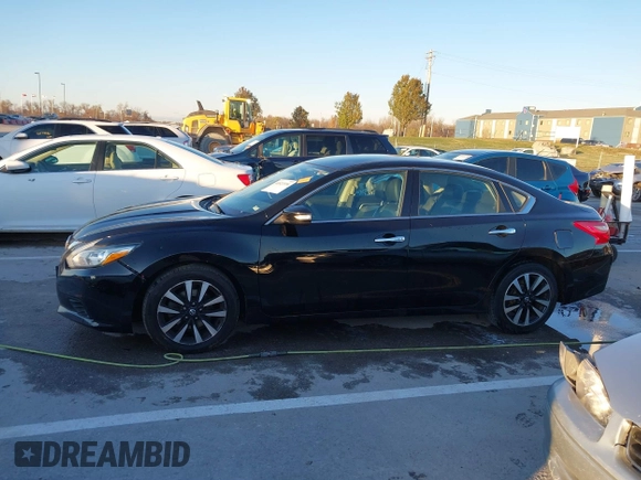 2018 Nissan Altima SR with VIN 1N4AL3AP7JC129741, listed as a IAAI auction lot 40923554 with 161,218 mi miles and . Bid and sale history available at carsss.com. Image 14.