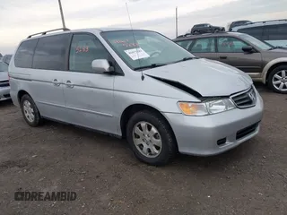 2002 Honda Odyssey EX with VIN 2HKRL18622H520087, listed as a IAAI auction lot 41675283 with 153,598 mi miles and . Bid and sale history available at DreamBid. Image 1.