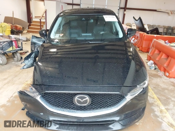 2020 Mazda CX-5 Grand Touring with VIN JM3KFADM3L0742625, listed as a IAAI auction lot 41715580 with 45,562 mi miles. Bid and sale history available at carsss.com. Image 13.