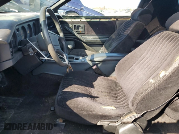 1989 Pontiac Firebird with VIN 1G2FS21E6KL245532, listed as a Copart auction lot 77085424 with 134,957 mi miles and Clean title. Bid and sale history available at DreamBid. Image 7.