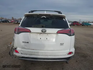 2018 Toyota RAV4 XLE with VIN 2T3RFREV2JW777906, listed as a IAAI auction lot 41164038 with 89,049 mi miles. Bid and sale history available at carsss.com. Image 17.