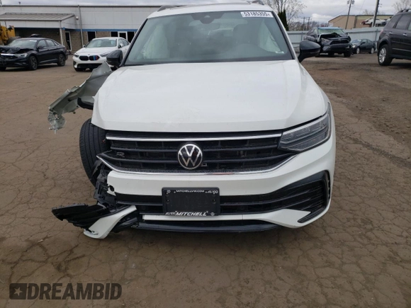 2023 Volkswagen Tiguan SE R-Line Black with VIN 3VV8B7AX8PM025044, listed as a Copart auction lot 53185355 with 35,565 mi miles and Salvage title. Bid and sale history available at DreamBid. Image 5.