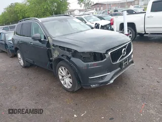 2016 Volvo XC90 T6 Momentum with VIN YV4A22PK7G1074115, listed as a IAAI auction lot 42083321 with 150,135 mi miles. Bid and sale history available at carsss.com. Image 1.