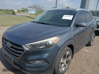 2016 Hyundai Tucson Limited with VIN KM8J33A29GU148840, listed as a IAAI auction lot 42064605 with 119,186 mi miles. Bid and sale history available at carsss.com. Image 17.