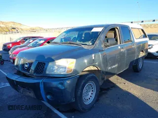 2005 Nissan Titan SE with VIN 1N6AA07A35N540675, listed as a IAAI auction lot 41263861 with 217,785 mi miles and . Bid and sale history available at DreamBid. Image 2.