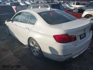 2012 BMW 5 Series 528i xDrive with VIN WBAXH5C57CDW06059, listed as a IAAI auction lot 41402225 with 167,656 mi miles. Bid and sale history available at carsss.com. Image 3.