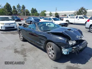 2002 Ford Thunderbird Hardtop Premium z VIN 1FAHP60A82Y103848, wystawiony jako IAAI lot #42467093 z przebiegiem Nie podano mil oraz . Historia ofert i sprzedaży dostępna na DreamBid. Obrazek 1.