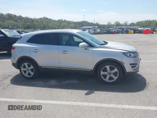 2015 Lincoln MKC with VIN 5LMCJ2A94FUJ16038, listed as a IAAI auction lot 42057400 with 102,848 mi miles. Bid and sale history available at carsss.com. Image 13.