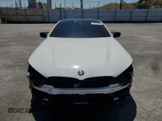 2020 BMW 8 Series M850i xDrive z VIN WBABC4C00LCE77534, wystawiony jako Copart lot #57640795 z przebiegiem Nie podano mil oraz Szkody całkowita. Historia ofert i sprzedaży dostępna na DreamBid. Obrazek 5.