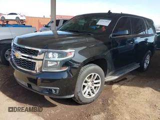 2015 Chevrolet Tahoe Commercial z VIN 1GNLC2EC0FR629983, wystawiony jako IAAI lot #41917584 z przebiegiem 111 461 mil mil oraz . Historia ofert i sprzedaży dostępna na DreamBid. Obrazek 2.