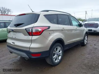 2017 Ford Escape SE with VIN 1FMCU0G99HUE68587, listed as a IAAI auction lot 41924307 with 89,609 mi miles. Bid and sale history available at carsss.com. Image 4.