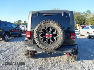 2015 Jeep Wrangler Unlimited Rubicon with VIN 1C4BJWFGXFL610153, listed as a IAAI auction lot 41575401 with 114,583 mi miles. Bid and sale history available at carsss.com. Image 16.